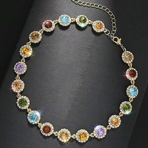 Infinity multicolored stone and gold necklace.
